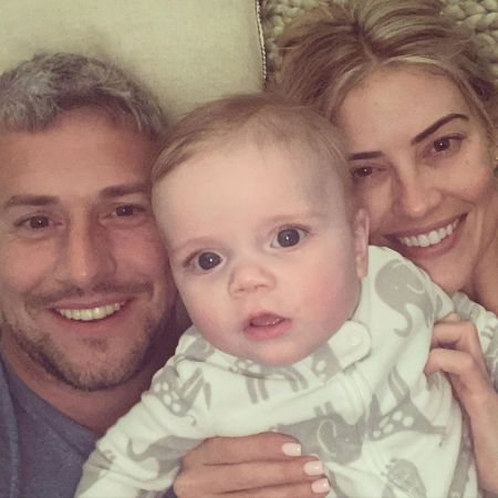 Ant Anstead and Christina holding their first baby boy 